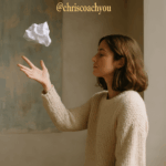 Femme lâchant un papier dans une ambiance douce, symbole de libération intérieure